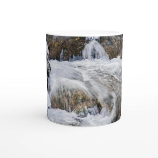 Big Hill Springs mug featuring a serene water scene captured on a white 15oz ceramic drinkware.