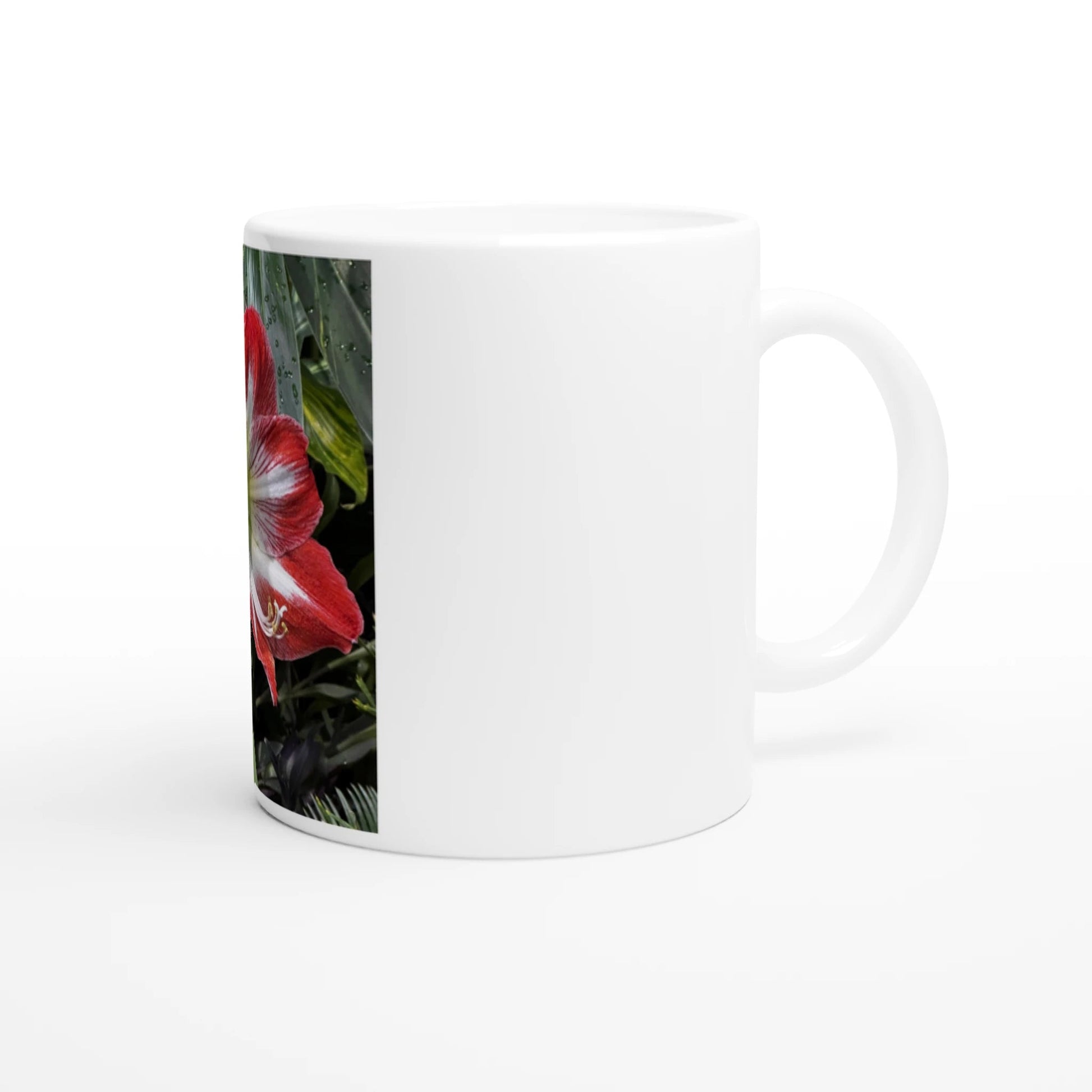 Amaryllis ceramic mug showcasing a glossy white finish with floral design on a side angle.