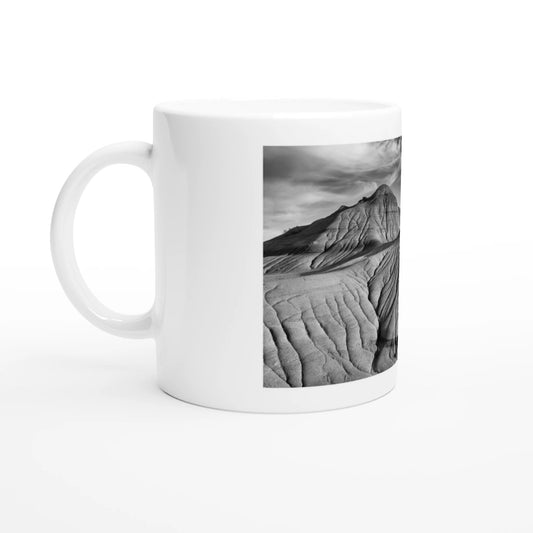 Black & white Dinosaur Provincial Park mug with scenic landscape design