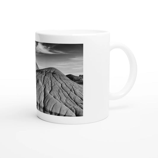 Black & white Dinosaur Provincial Park mug with scenic landscape design