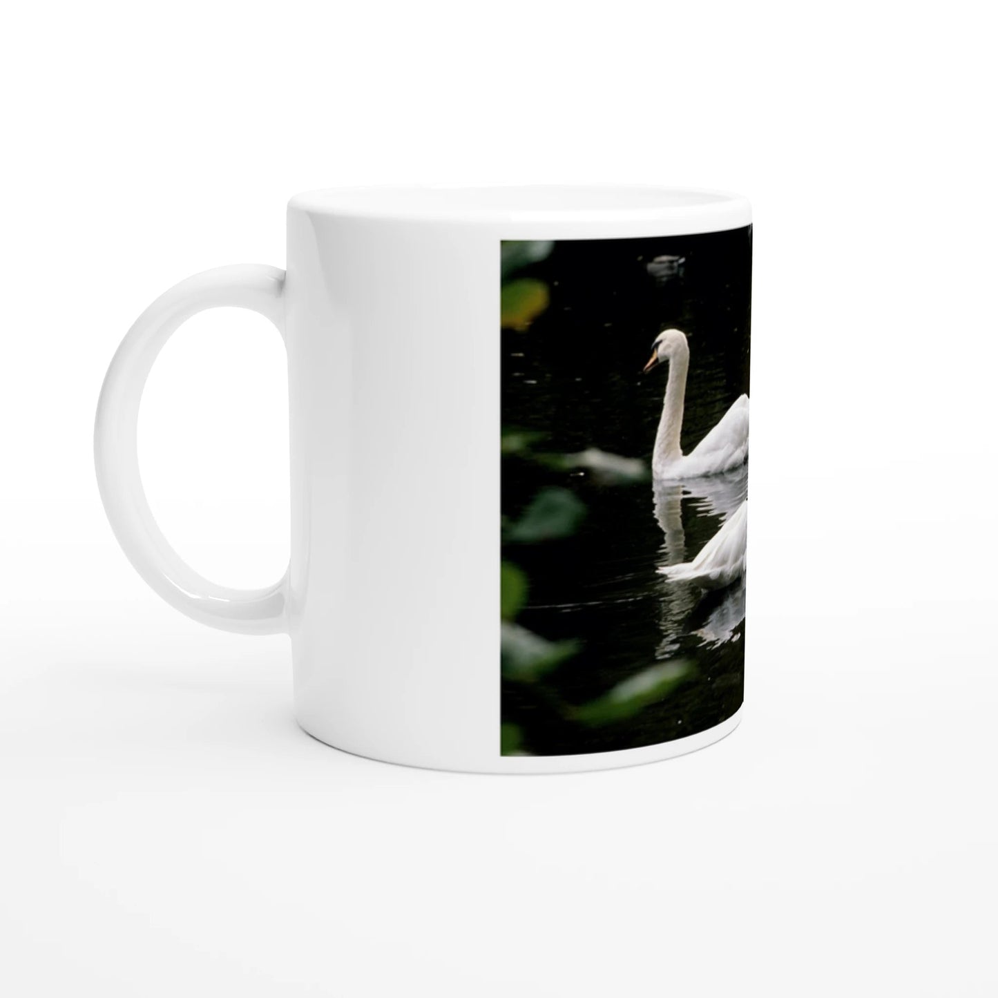Two swans ceramic mug featuring a graceful swan design on a glossy white 11oz cup.