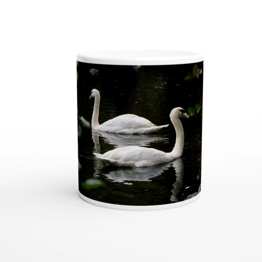Two swans ceramic mug featuring a graceful swan design on a glossy white 11oz cup.