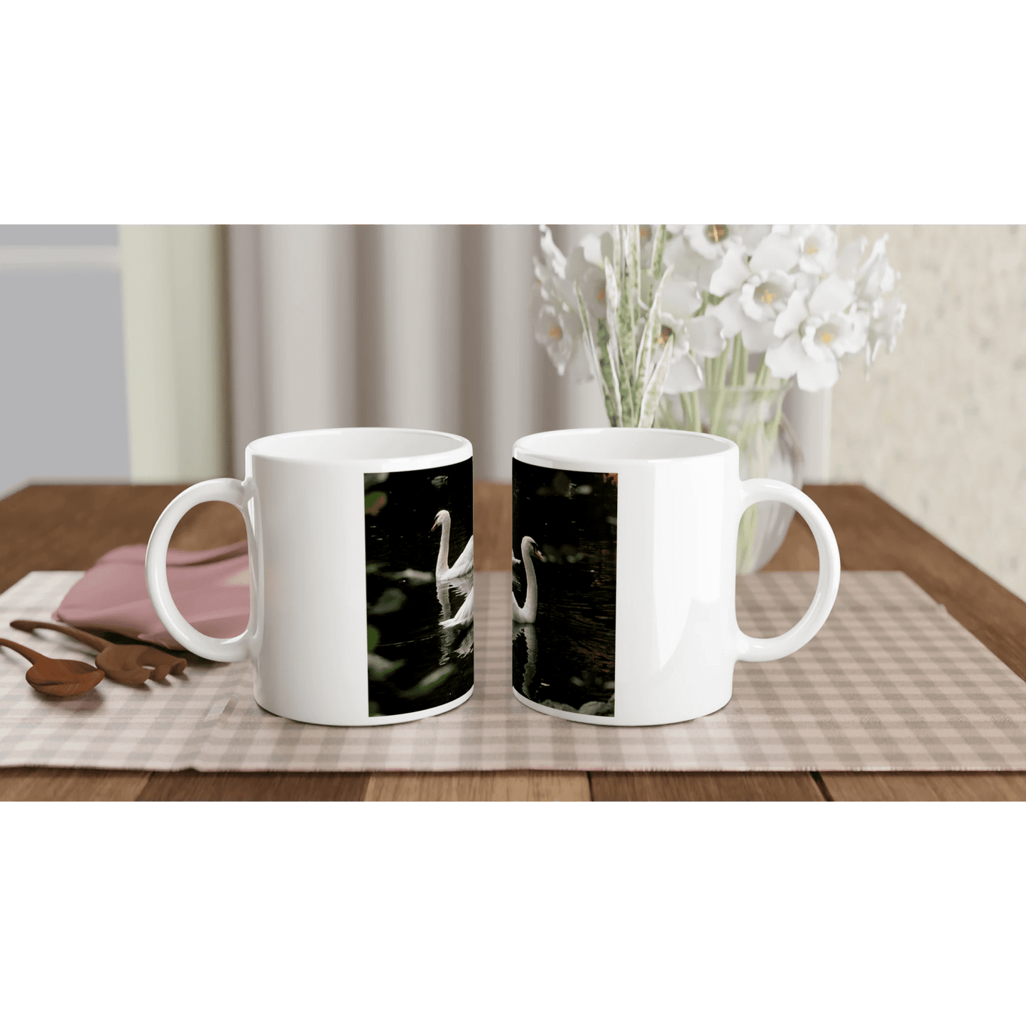 Two swans ceramic mug featuring a graceful swan design on a glossy white 11oz cup.
