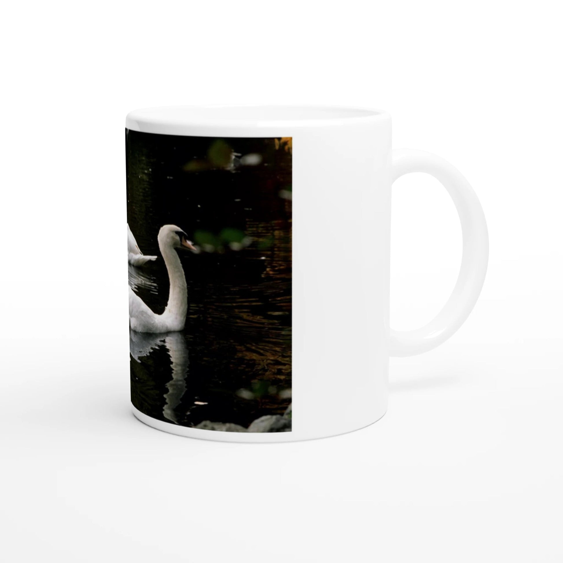 Two swans ceramic mug featuring a graceful swan design on a glossy white 11oz cup.